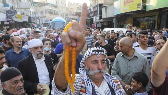 Los musulmanes palestinos celebran el nacimiento del profeta Mahoma, conocido en árabe como Mawlid al-Nabawi, en la ciudad ocupada de Nablus, en Cisjordania. (Foto de JAAFAR ASHTIYEH / AFP)