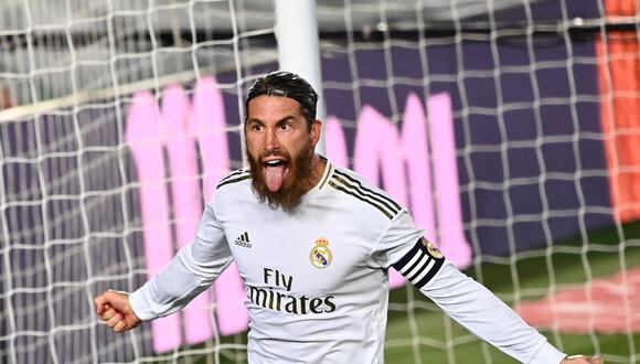 Real Madrid's Spanish defender Sergio Ramos celebrates after scoring during the Spanish league football match Real Madrid CF againsrt Getafe CF at the Alfredo di Stefano stadium in Valdebebas, on the outskirts of Madrid, on July 2, 2020. (Photo by GABRIEL BOUYS / AFP)