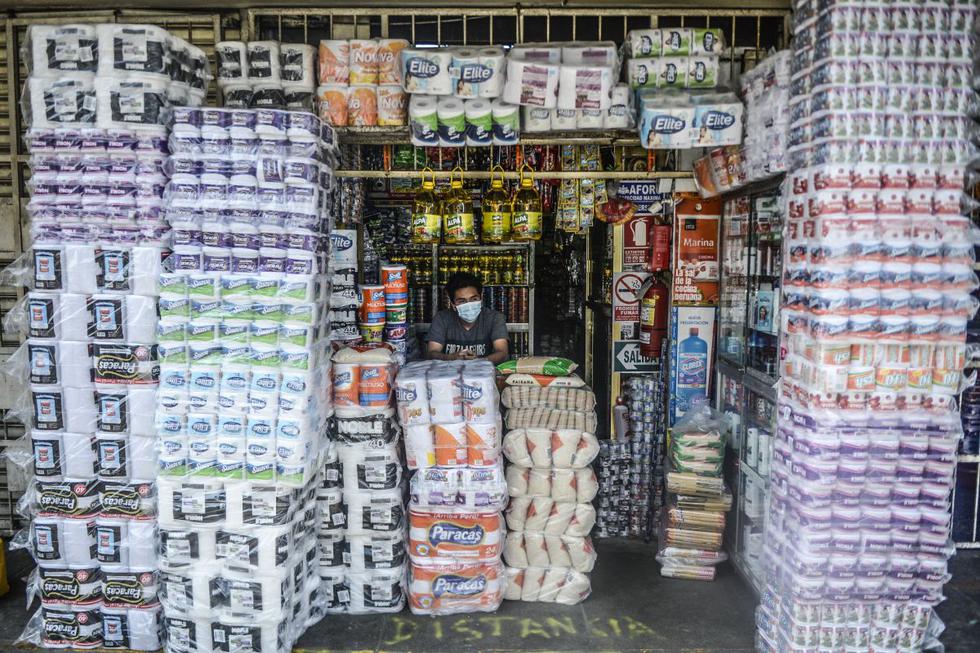 A merchant waits for clients at his stall in the Caqueta market in the north of Lima on April 30, 2020 amid the Covid-19 coronavirus outbreak. (Photo by ERNESTO BENAVIDES / AFP)