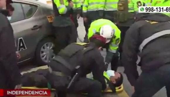 Uno de los policías heridos tras choque de patrullero con taxi, en Independencia. (Captura: América Noticias)
