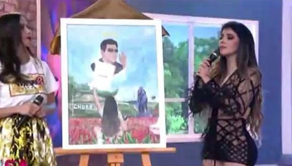 María Grazia Polanco se quiebra en vivo tras recibir cuadro con la imagen de su padre fallecido. (Foto: captura de video)