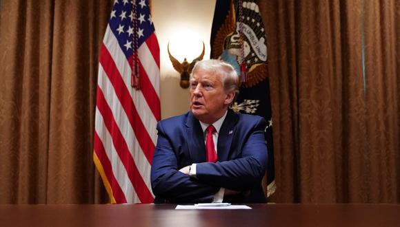 US President Donald Trump speaks during a meeting with healthcare executives in the Cabinet Room of the White House in Washington, DC on April 14, 2020. / AFP / MANDEL NGAN
