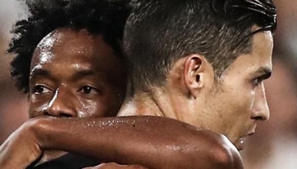Cristiano Ronaldo y Juan Cuadrado evidenciaron su gran amistad con el festejo. (Foto: AFP)
