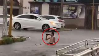 Hombre toma cerveza en medio de inundación en calles de México [VIDEO]