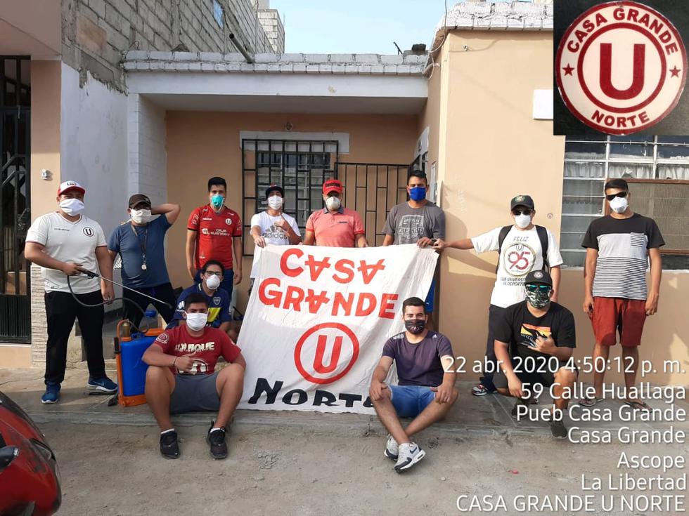 Hinchas de Universitario se unen para desinfectar calles en Casagrande