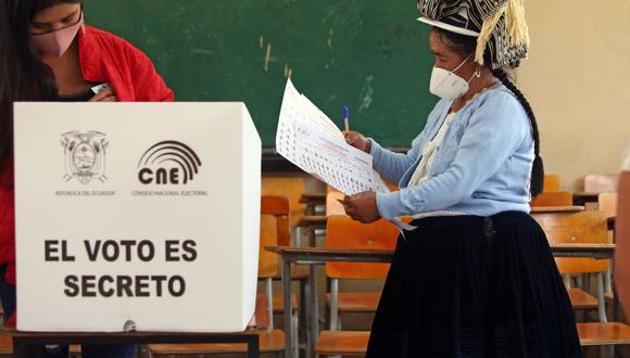 Para conocer tu lugar de votación, ingresa a la página web del CNE, luego deberás colocar los datos que allí te soliciten (Foto: Cristina Vega RHOR / AFP).