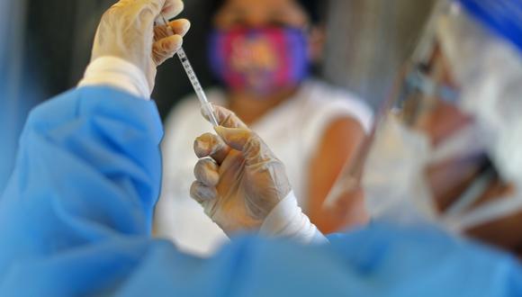 El Ministerio de Salud pide a población completar Esquema Nacional de Vacunación contra otras 26 enfermedades distintas al COVID-19. (Foto: Luka GONZALES / AFP)