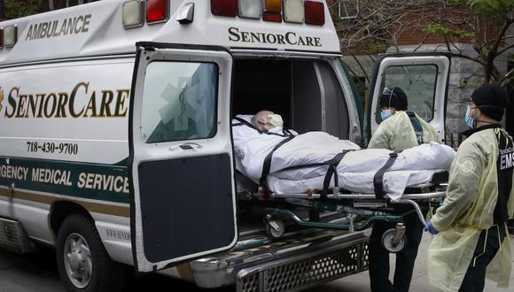 La cifra de infectados y muertos en el país norteamericano sigue aumentando. (AP Photo/John Minchillo)